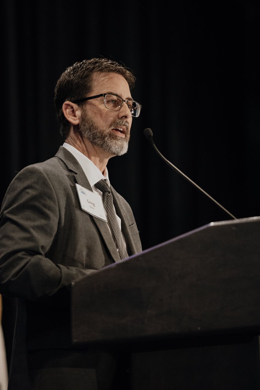 Greg Burt speaking at the 2023 Sacramento gala