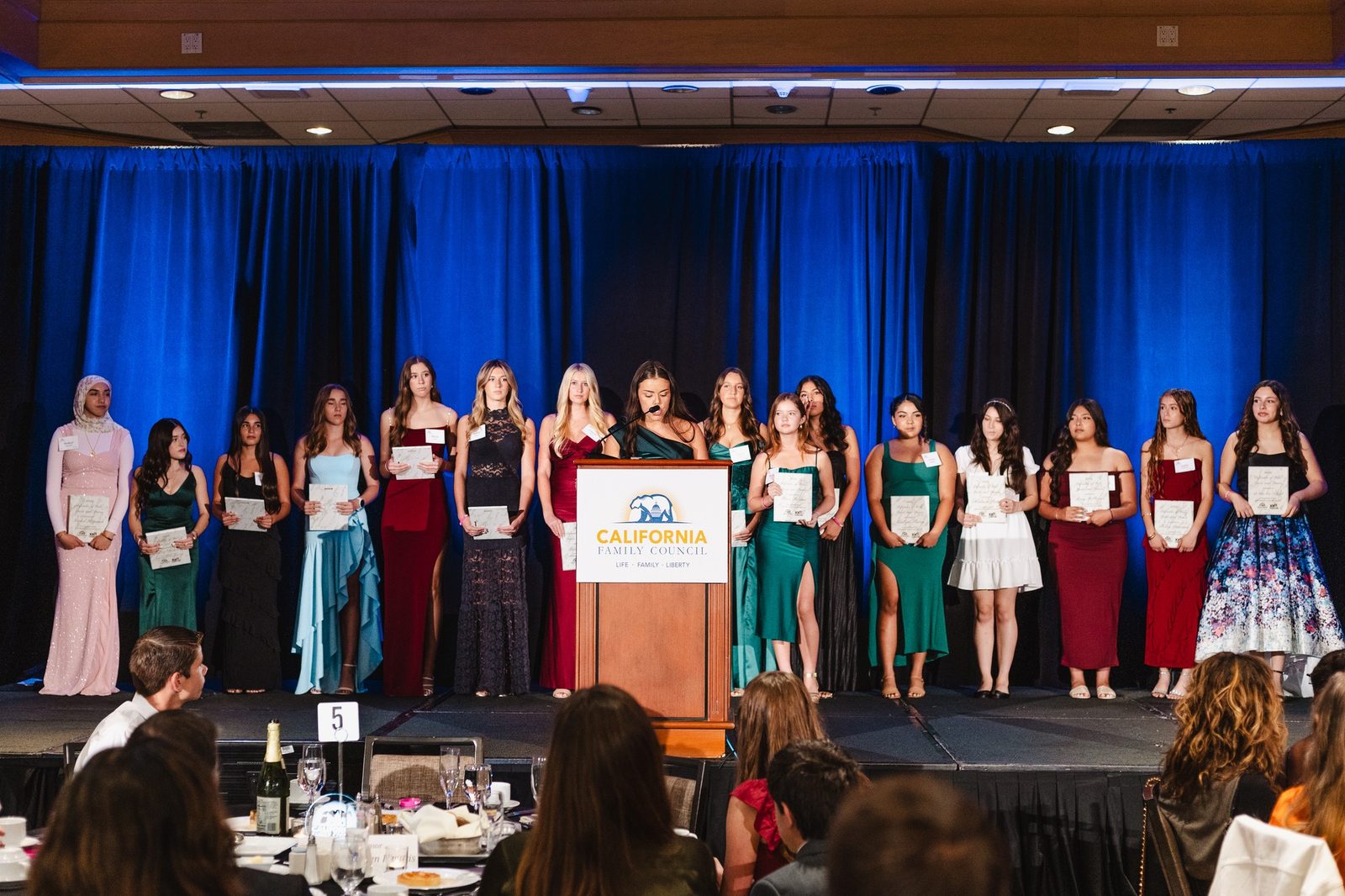 Female athletes honored on stage